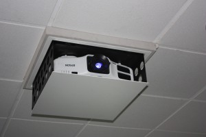 CCCC - Projector which recesses back into ceiling for flush finish
