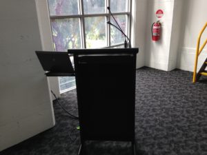 The presenter lectern with gooseneck microphone