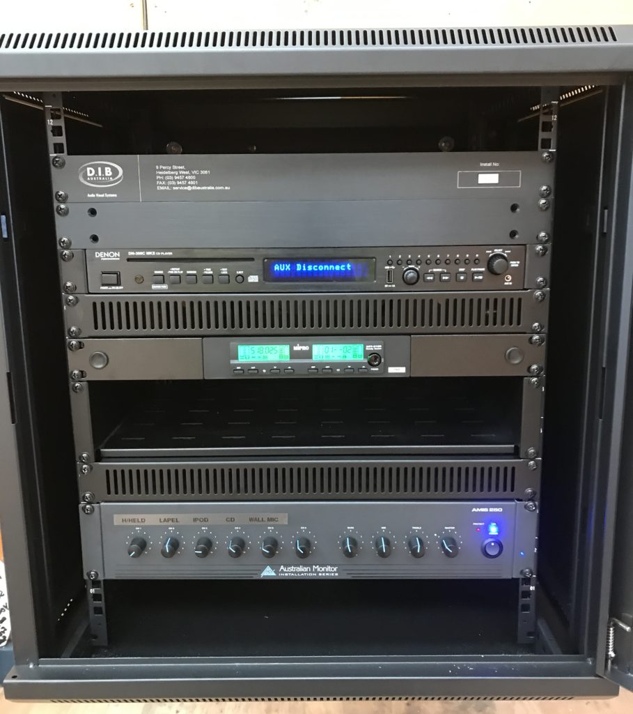 AV rack with an AM AMIS250 Mixer Amplifier, Dual Mipro wireless microphone system and Denon 300C CD/Media player with Plenty Parklands