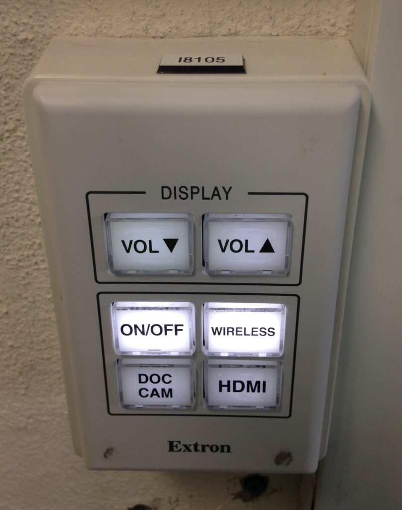 Extron MLC55 6-button wall control panel at PLC