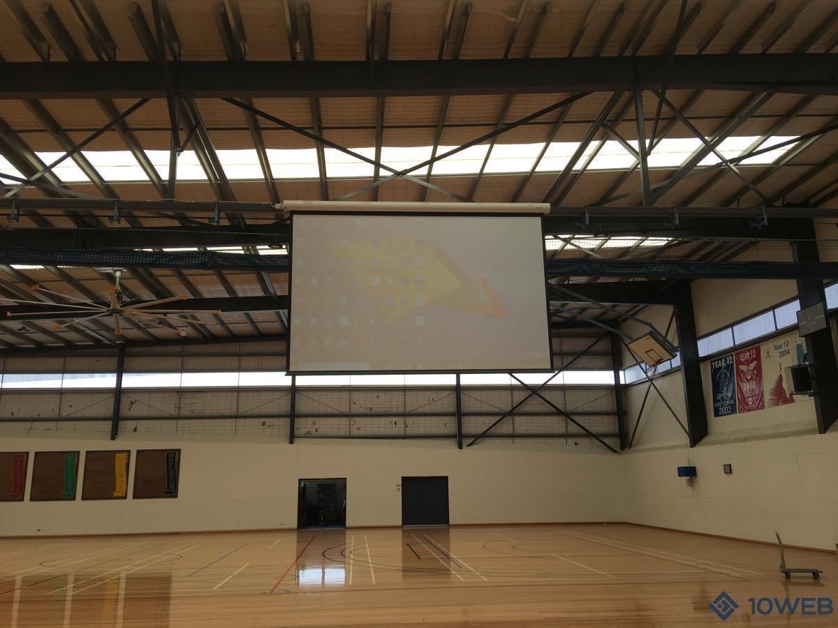 Relocated projector screen
